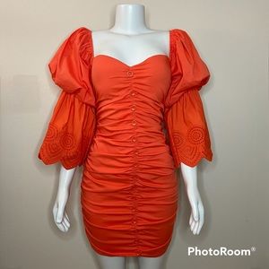 Orange off shoulder gathered sleeve crisscross back bodycon ruched mini dress